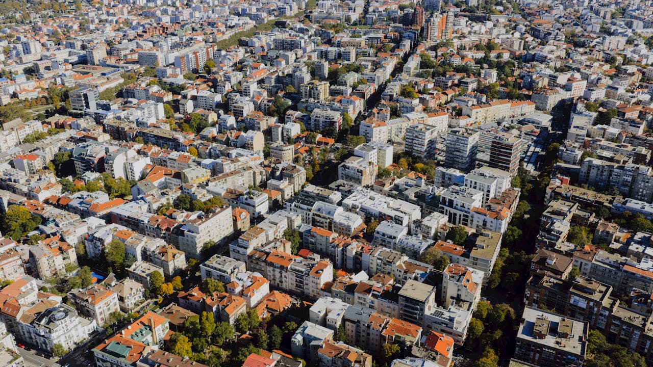 creative-02 Stunning aerial view showcasing the dense urban landscape of Belgrade, Serbia.